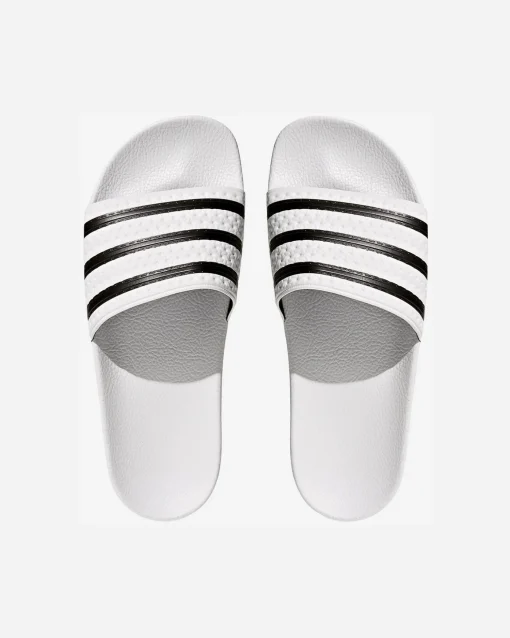 ADILETTE M